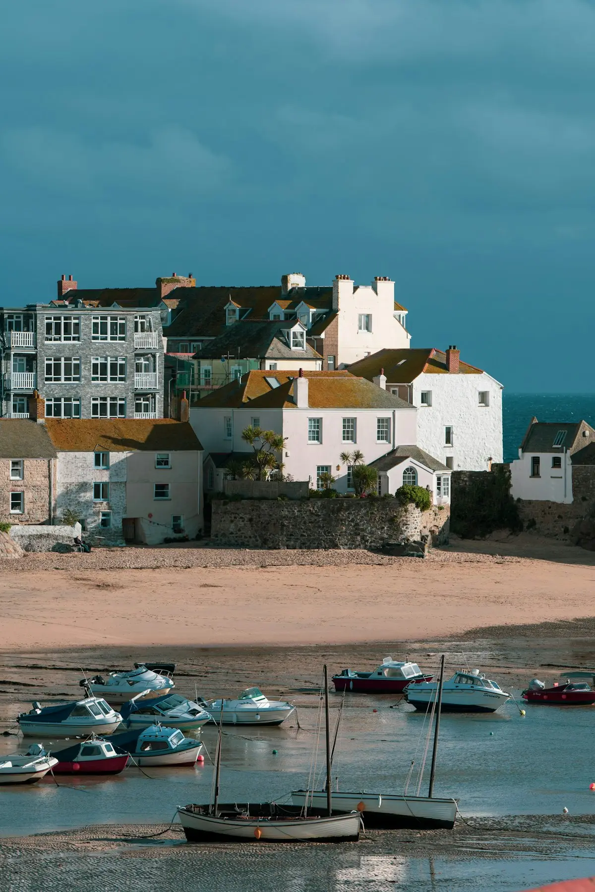 The harbour at low water, the boats resting on the sand